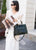 Noir Embossed Leather Handbag