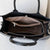 Noir Embossed Leather Handbag